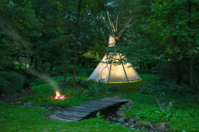 white tent in forest during night time